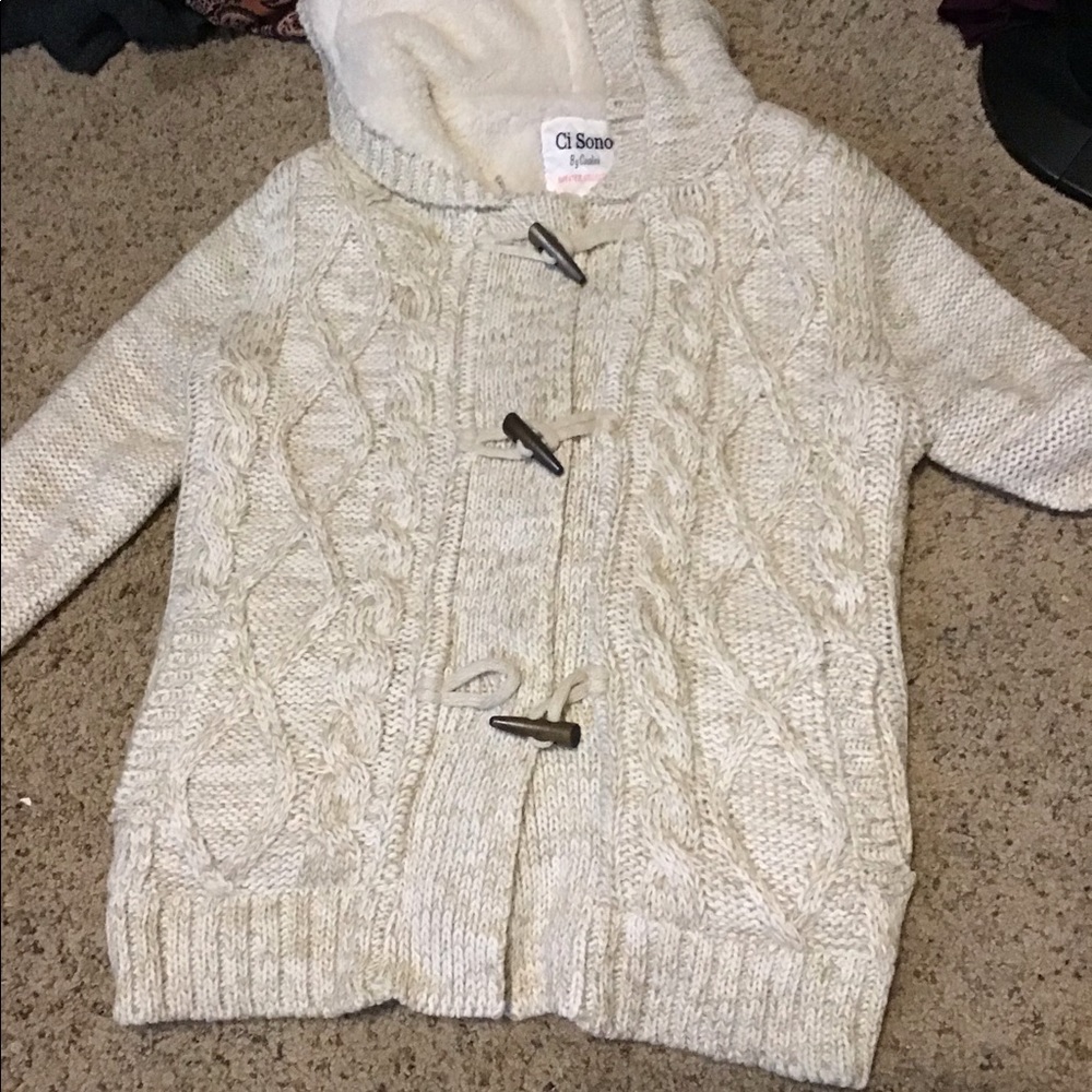 White cable knit sweater